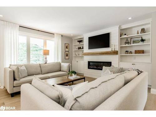 66 Finlay Mill Road, Midhurst, ON - Indoor Photo Showing Living Room With Fireplace