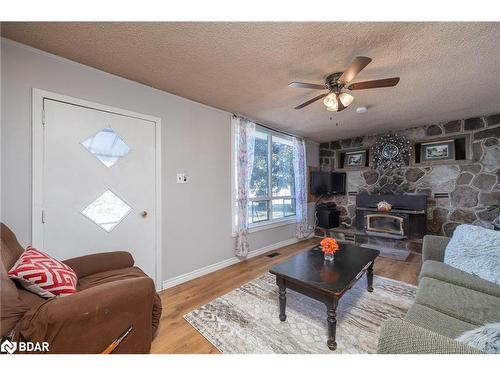 718506 Hwy 6 Highway, Shallow Lake, ON - Indoor Photo Showing Living Room With Fireplace