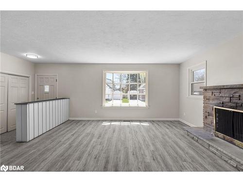 138 Peel Street, Barrie, ON - Indoor Photo Showing Living Room With Fireplace