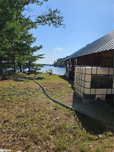 2035C Fifth Lake Road, Sharbot Lake, ON - Outdoor With Body Of Water With View