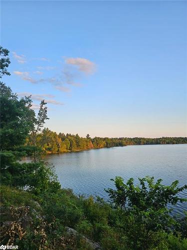 2035C Fifth Lake Road, Sharbot Lake, ON - Outdoor With Body Of Water With View