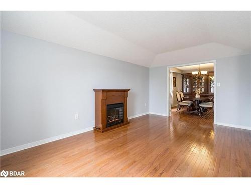 28 Sun King Crescent, Barrie, ON - Indoor Photo Showing Living Room With Fireplace