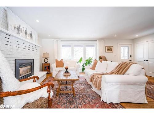 15 Parklane Court, Tiny, ON - Indoor Photo Showing Living Room With Fireplace