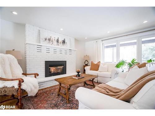 15 Parklane Court, Tiny, ON - Indoor Photo Showing Living Room With Fireplace