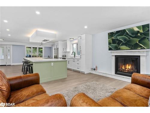 30 Golf Course Road, Bracebridge, ON - Indoor Photo Showing Living Room With Fireplace