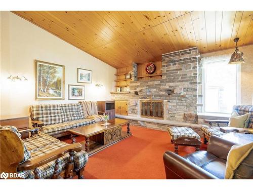 141 Mitchell'S Beach Road, Victoria Harbour, ON - Indoor Photo Showing Living Room With Fireplace