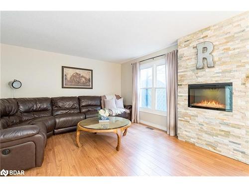 173 Toronto Street, Barrie, ON - Indoor Photo Showing Living Room With Fireplace