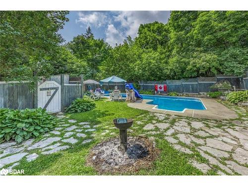 75 Patrick Street, Orillia, ON - Outdoor With In Ground Pool With Backyard