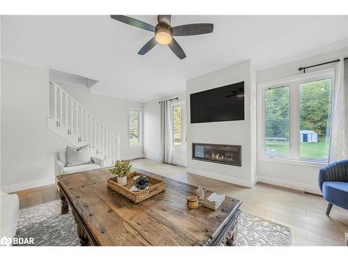 38 Lilac Lane, Midhurst, ON - Indoor Photo Showing Living Room With Fireplace