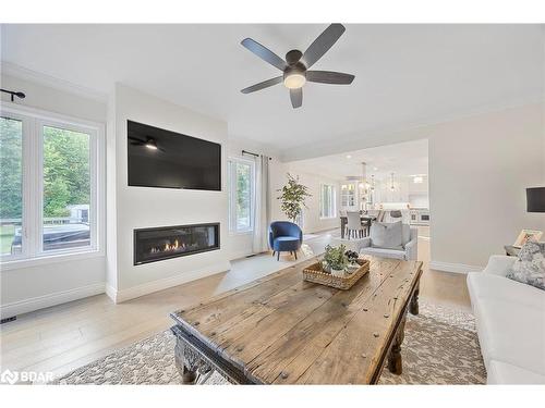 38 Lilac Lane, Midhurst, ON - Indoor Photo Showing Living Room With Fireplace