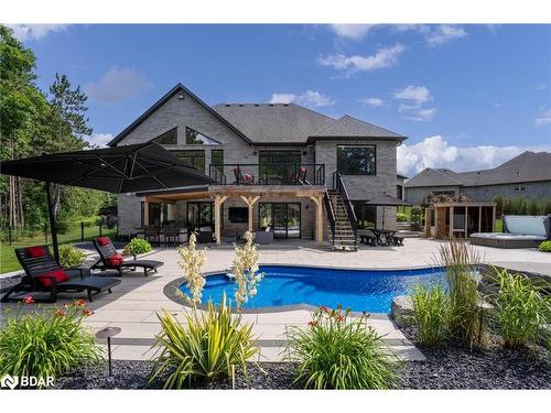 105 Mennill Drive, Springwater, ON - Outdoor With In Ground Pool With Deck Patio Veranda