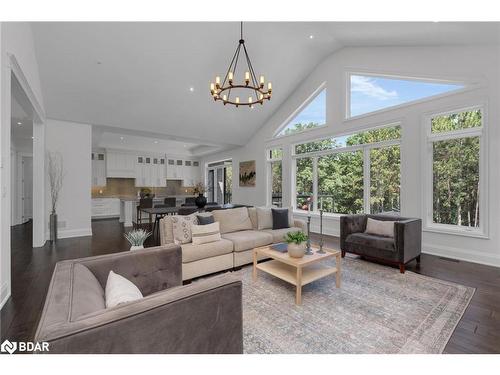 105 Mennill Drive, Springwater, ON - Indoor Photo Showing Living Room With Fireplace