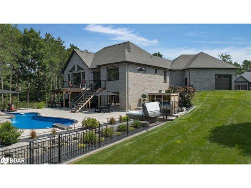 105 Mennill Drive, Springwater, ON - Outdoor With In Ground Pool With Backyard