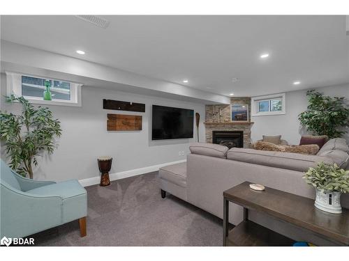 20 Dalton Crescent S, Orillia, ON - Indoor Photo Showing Living Room With Fireplace