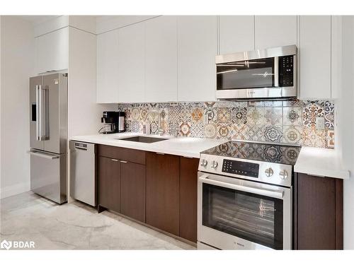 309-295 Cundles Road E, Barrie, ON - Indoor Photo Showing Kitchen