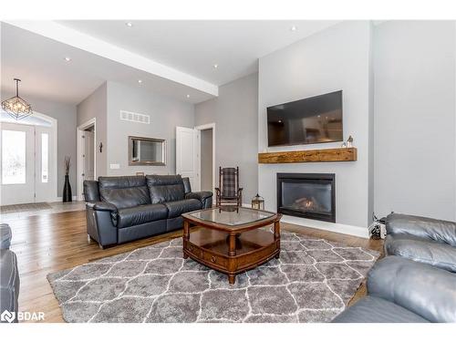 4428 North Valley Lane, Severn, ON - Indoor Photo Showing Living Room With Fireplace