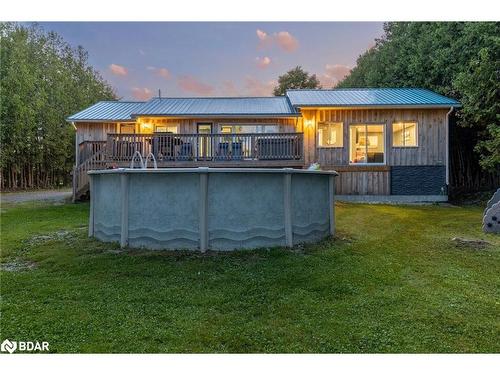 130 Crawford Road, Kawartha Lakes, ON - Outdoor With Above Ground Pool With Deck Patio Veranda