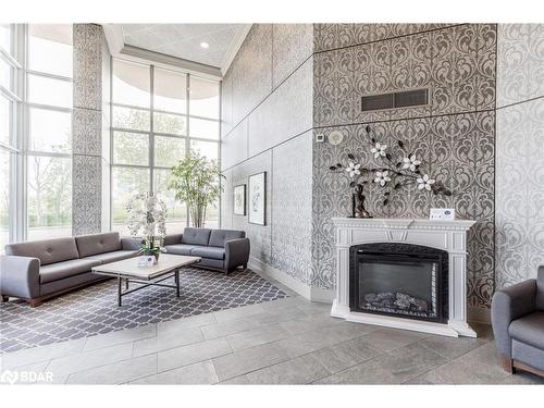 Ph1 1-2 Toronto Street, Barrie, ON - Indoor Photo Showing Living Room With Fireplace