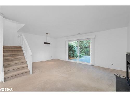 123 Escarpment Crescent, Collingwood, ON - Indoor Photo Showing Other Room With Fireplace