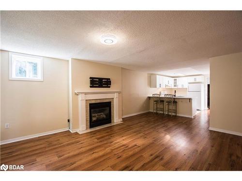 59 Livingstone Street E, Barrie, ON - Indoor Photo Showing Living Room With Fireplace