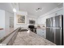 603-150 Dunlop Street E, Barrie, ON  - Indoor Photo Showing Kitchen With Stainless Steel Kitchen With Double Sink With Upgraded Kitchen 