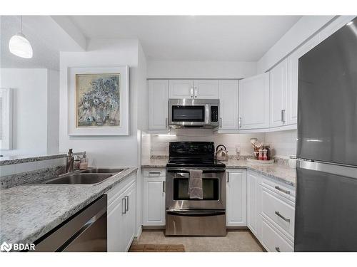 603-150 Dunlop Street E, Barrie, ON - Indoor Photo Showing Kitchen With Stainless Steel Kitchen With Double Sink With Upgraded Kitchen