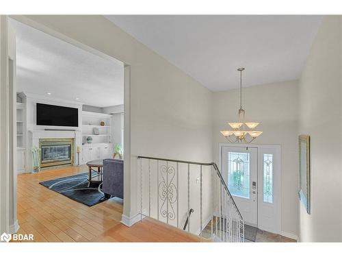 12 Roslyn Road, Barrie, ON - Indoor Photo Showing Other Room With Fireplace