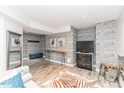 11 Oakmont Avenue, Horseshoe Valley, ON - Indoor Photo Showing Living Room With Fireplace