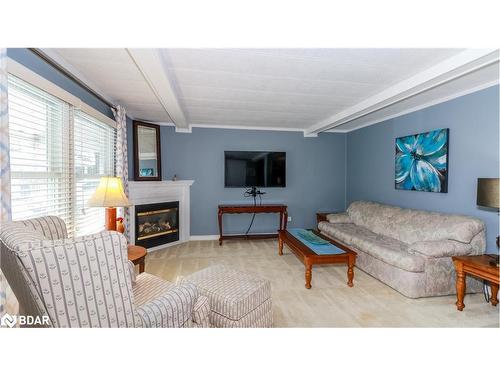 101 Linden Lane, Innisfil, ON - Indoor Photo Showing Living Room With Fireplace