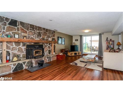 250 Superior Street, Stayner, ON - Indoor Photo Showing Living Room With Fireplace