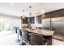 27 Marilyn Avenue S, Wasaga Beach, ON  - Indoor Photo Showing Kitchen With Double Sink With Upgraded Kitchen 