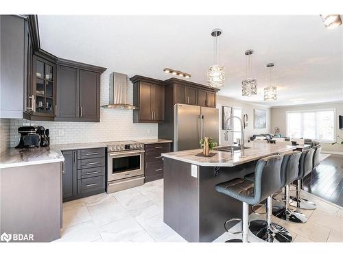 27 Marilyn Avenue S, Wasaga Beach, ON - Indoor Photo Showing Kitchen With Upgraded Kitchen