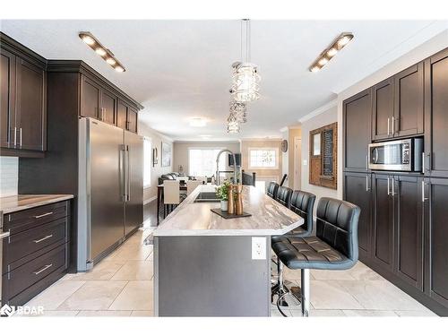 27 Marilyn Avenue S, Wasaga Beach, ON - Indoor Photo Showing Kitchen With Upgraded Kitchen