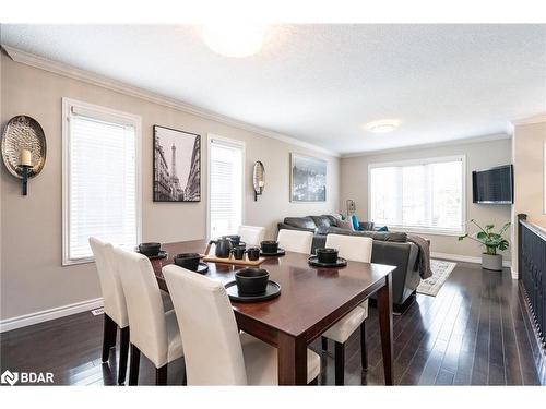 27 Marilyn Avenue S, Wasaga Beach, ON - Indoor Photo Showing Dining Room With Fireplace