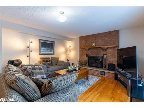 748 Adelaide Avenue E, Oshawa, ON - Indoor Photo Showing Living Room With Fireplace