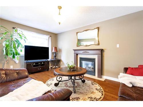 136 Griffin Street, Midland, ON - Indoor Photo Showing Living Room With Fireplace