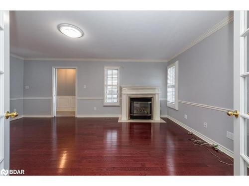 927 Barry Avenue, Innisfil, ON - Indoor Photo Showing Living Room With Fireplace