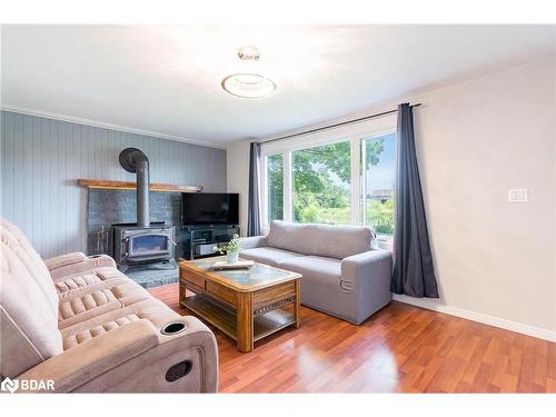 6582 Yonge Street, Innisfil, ON - Indoor Photo Showing Living Room With Fireplace