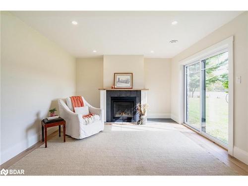 2886 Southorn Road, Coldwater, ON - Indoor Photo Showing Living Room With Fireplace