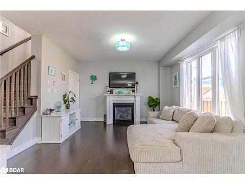 82 Nathan Crescent, Barrie, ON - Indoor Photo Showing Living Room With Fireplace