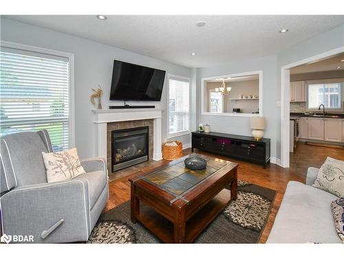 452 Greenwood Drive, Essa, ON - Indoor Photo Showing Living Room With Fireplace