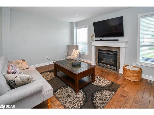 452 Greenwood Drive, Essa, ON - Indoor Photo Showing Living Room With Fireplace