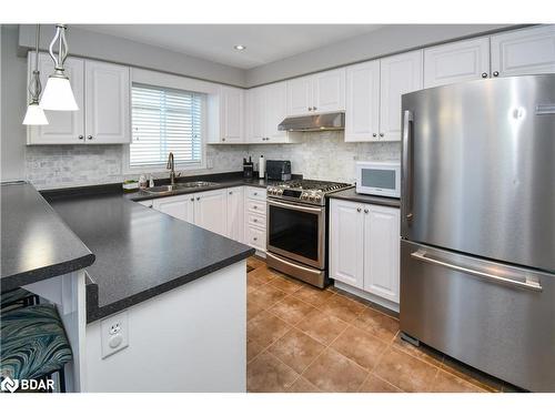 452 Greenwood Drive, Essa, ON - Indoor Photo Showing Kitchen With Double Sink