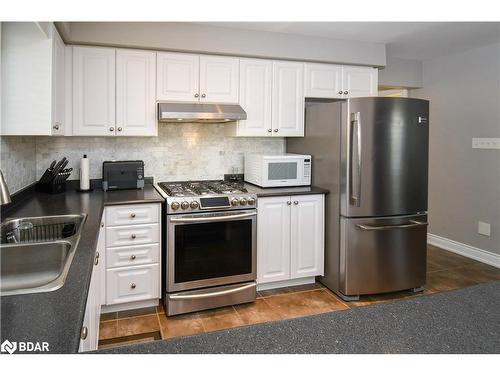 452 Greenwood Drive, Essa, ON - Indoor Photo Showing Kitchen With Double Sink