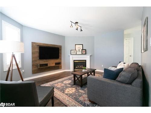 33 Logan Court, Barrie, ON - Indoor Photo Showing Living Room With Fireplace