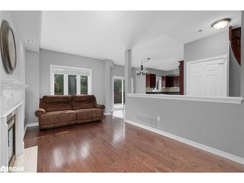 Main-1951 Swan Street, Innisfil, ON - Indoor Photo Showing Other Room With Fireplace