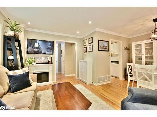 10-492 Laclie St Street, Orillia, ON - Indoor Photo Showing Other Room With Fireplace