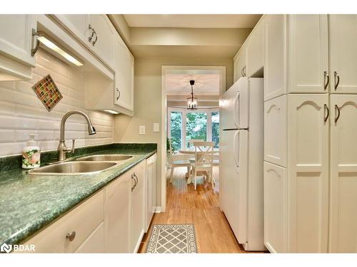 10-492 Laclie St Street, Orillia, ON - Indoor Photo Showing Kitchen With Double Sink