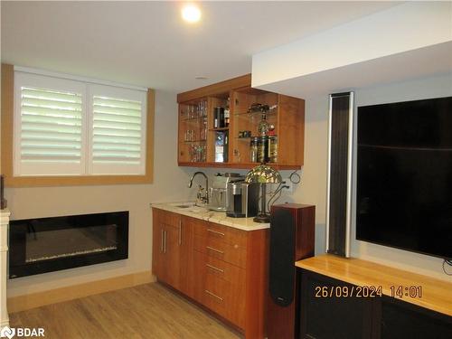 1189 Sunnidale Road, Springwater, ON - Indoor Photo Showing Living Room With Fireplace