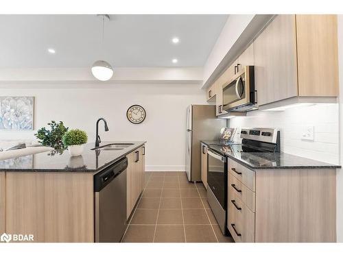 506-4 Spice Way, Barrie, ON - Indoor Photo Showing Kitchen With Stainless Steel Kitchen With Upgraded Kitchen